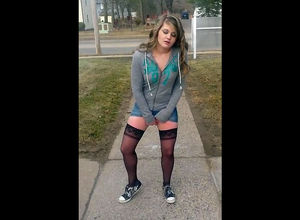 Teenager in tights and sneakers bangs..
