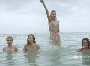 4 teenages naturist love being bare at..